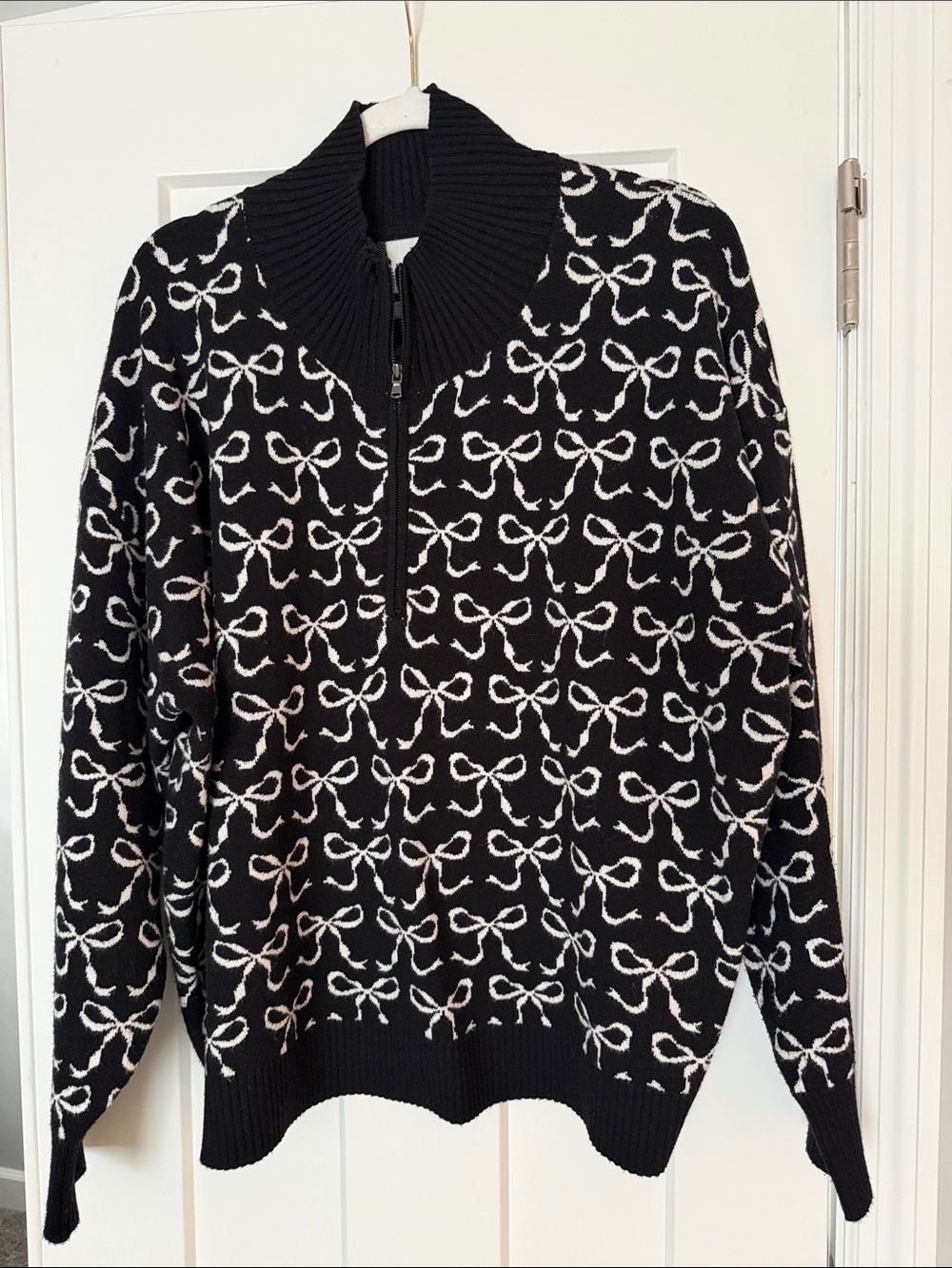 Maeve Black Zip-Turtleneck Sweater with White Bow Pattern